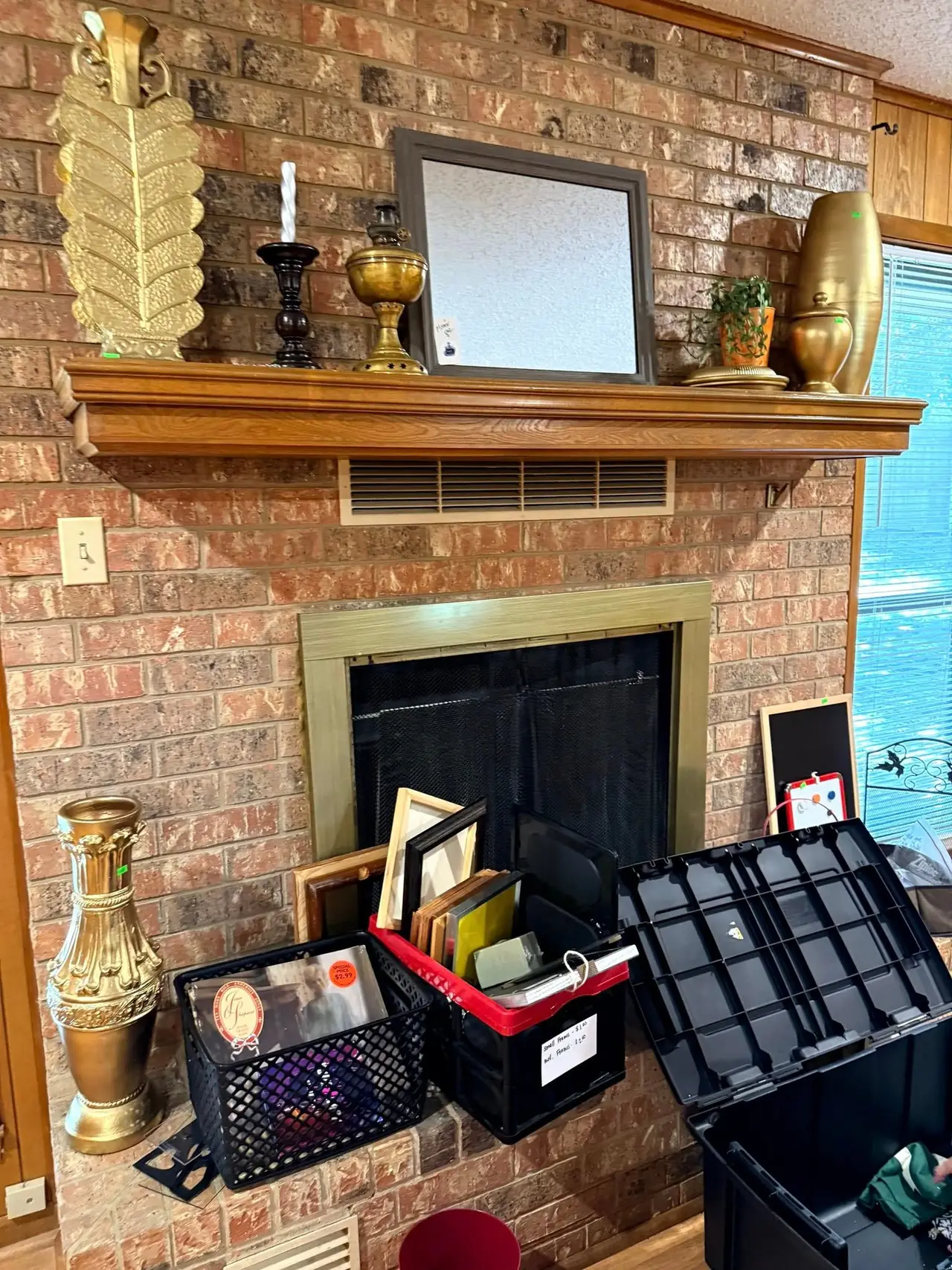 Estate contents sorted at the hearth before anything is loaded.