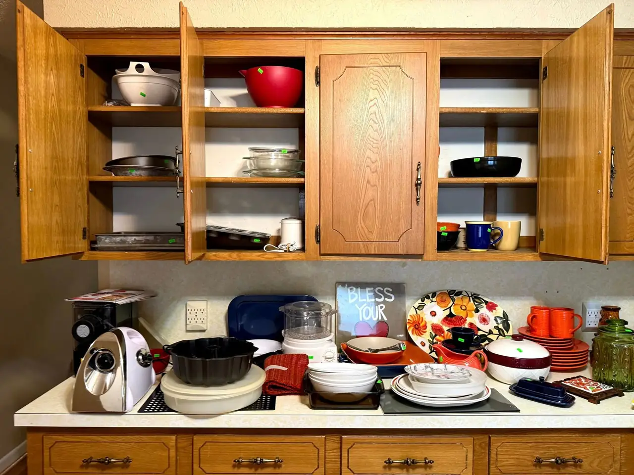 Cabinets emptied one shelf at a time — nothing goes out unseen.
